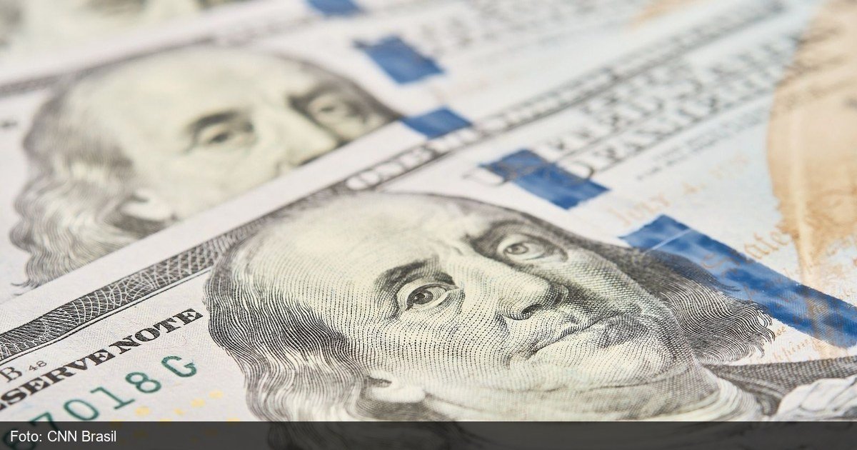 Graficos economicos ilustrando queda do desemprego no Brasil em 2026